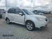 2014 Subaru Forester Limited z VIN JF2SJAHC5EH506704, wystawiony jako Copart lot #63712635 z przebiegiem 138 526 mil mil oraz Szkoda całkowita • Salvage title. Historia ofert i sprzedaży dostępna na DreamBid. Obrazek 4.