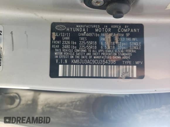 2012 Hyundai Tucson GLS z VIN KM8JU3AC9CU354398, wystawiony jako Copart lot #84408225 z przebiegiem 159 585 mil mil oraz Szkoda całkowita • Salvage title. Historia ofert i sprzedaży dostępna na DreamBid. Obrazek 13.