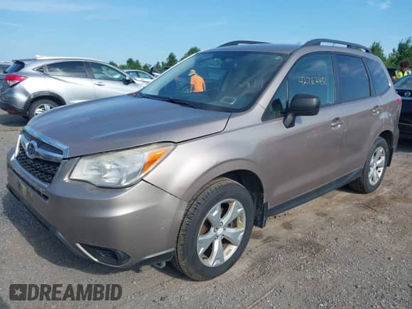 2014 Subaru Forester Premium with VIN JF2SJACC4EG405795, listed as a IAAI auction lot 42762451 with 267,393 mi miles and . Bid and sale history available at DreamBid. Image 2.