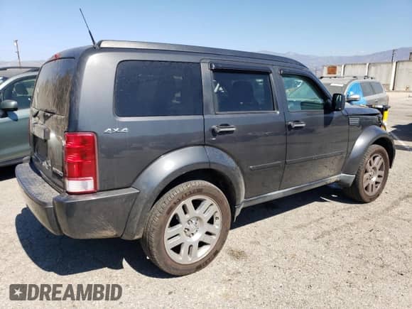 2011 Dodge Nitro Heat with VIN 1D4PU4GX4BW543979, listed as a Copart auction lot 81152475 with 180,895 mi miles and Salvage title. Bid and sale history available at DreamBid. Image 3.