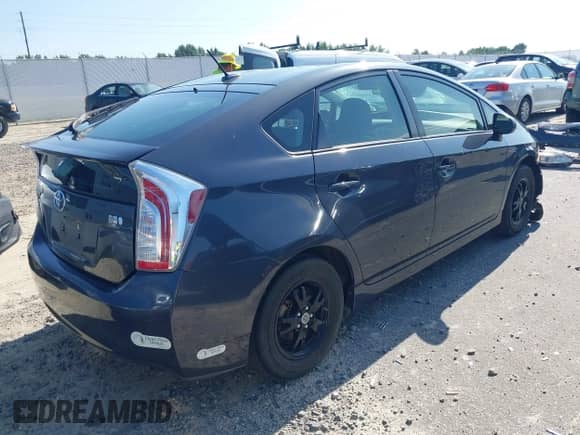 2015 Toyota Prius Three z VIN JTDKN3DU1F1904256, wystawiony jako IAAI lot #42779397 z przebiegiem 98 024 mil mil oraz . Historia ofert i sprzedaży dostępna na DreamBid. Obrazek 4.