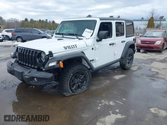 2022 Jeep Wrangler Unlimited Sport S с VIN 1C4HJXDG3NW155467, выставлен на аукционе IAAI как лот 41638650 с пробегом 22 698 миль миль и . История ставок и продаж доступна на DreamBid. Изображение 2.
