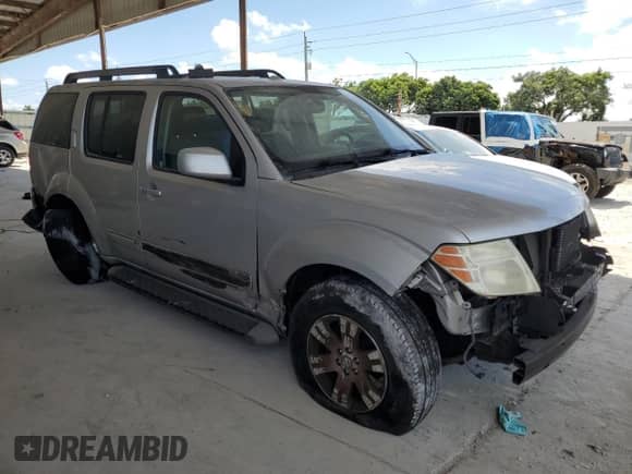2012 Nissan Pathfinder SV with VIN 5N1AR1NN1CC636817, listed as a Copart auction lot 69251155 with 165,379 mi miles and Salvage title. Bid and sale history available at DreamBid. Image 4.