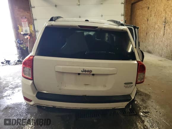 2011 Jeep Compass Latitude с VIN 1J4NT1FB2BD203909, выставлен на аукционе Copart как лот 86264095 с пробегом 183 351 миль миль и Списание • Salvage title. История ставок и продаж доступна на DreamBid. Изображение 6.