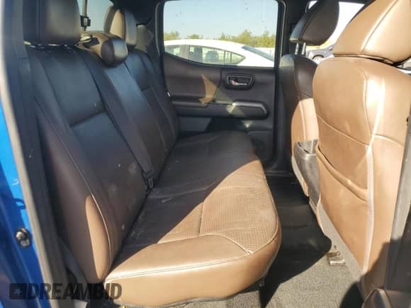 2016 Toyota Tacoma Limited с VIN 3TMGZ5AN9GM018015, выставлен на аукционе Copart как лот 82370585 с пробегом 185 654 миль миль и Списание • Salvage title. История ставок и продаж доступна на DreamBid. Изображение 10.