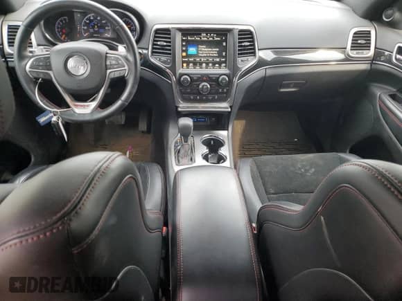 2017 Jeep Grand Cherokee Trailhawk z VIN 1C4RJFLGXHC810164, wystawiony jako Copart lot #71066465 z przebiegiem 87 912 mil mil oraz Szkoda całkowita • Salvage title. Historia ofert i sprzedaży dostępna na DreamBid. Obrazek 8.