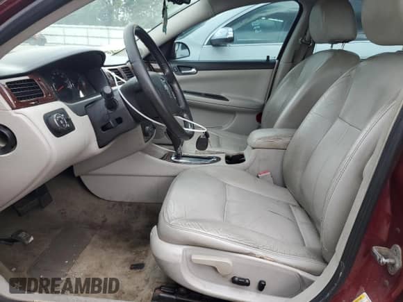 2011 Chevrolet Impala LTZ z VIN 2G1WC5EM8B1171086, wystawiony jako Copart lot #67345885 z przebiegiem 231 621 mil mil oraz Szkoda całkowita • Salvage title. Historia ofert i sprzedaży dostępna na DreamBid. Obrazek 7.