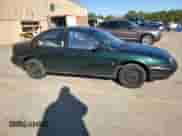 1997 Saturn SL with VIN 1G8ZH5281VZ133993, listed as a Copart auction lot 87155774 with 135,932 mi miles and Salvage title. Bid and sale history available at DreamBid. Image 4.