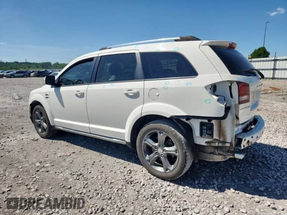2015 Dodge Journey Crossroad with VIN 3C4PDCGG5FT630793, listed as a Copart auction lot 63031975 with 131,623 mi miles and Salvage title. Bid and sale history available at DreamBid. Image 2.