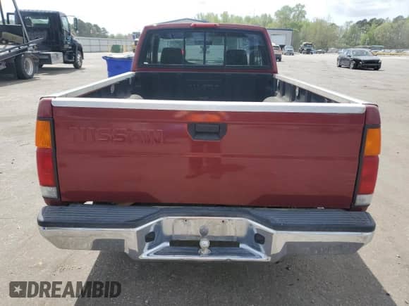 1995 Nissan Frontier with VIN 1N6SD16S4SC431726, listed as a Copart auction lot 51716055 with 195,714 mi miles and Salvage title. Bid and sale history available at DreamBid. Image 6.