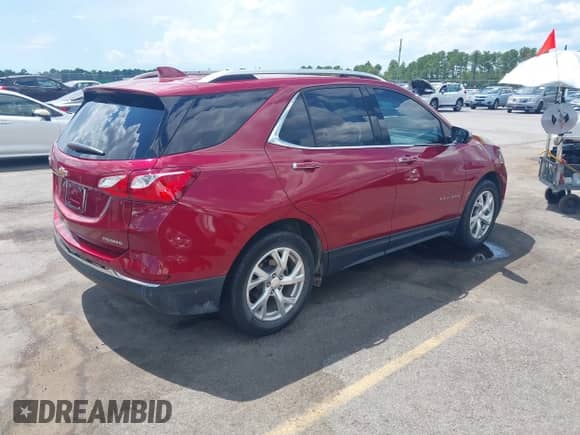 2020 Chevrolet Equinox Premier with VIN 2GNAXNEV6L6262478, listed as a IAAI auction lot 42829038 with 51,303 mi miles and . Bid and sale history available at DreamBid. Image 4.