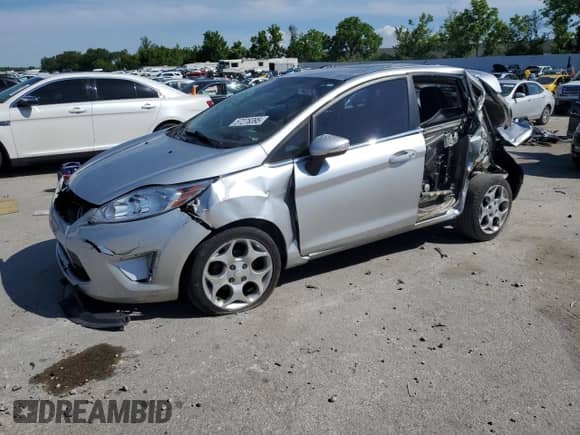 2011 Ford Fiesta SES with VIN 3FADP4FJ5BM200284, listed as a Copart auction lot 57276395 with 161,849 mi miles and Salvage title. Bid and sale history available at DreamBid. Image 1.