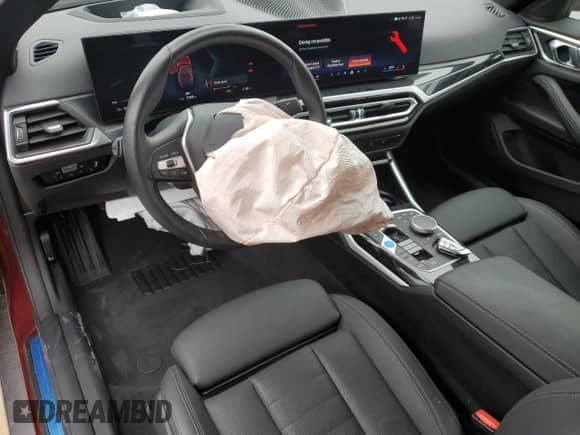 2024 BMW i4 eDrive35 with VIN WBY43AW06RFR52113, listed as a Copart auction lot 41768765 with 21,588 mi miles and Clean title. Bid and sale history available at DreamBid. Image 8.