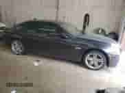 2012 BMW 5 Series 550i xDrive with VIN WBAFU9C53CDY69986, listed as a Copart auction lot 57281555 with 106,817 mi miles and Clean title. Bid and sale history available at DreamBid. Image 4.