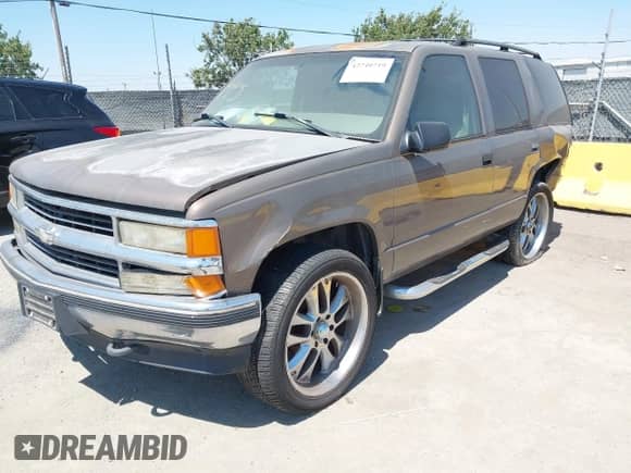 1997 Chevrolet Tahoe с VIN 1GNEK13R4VJ442823, выставлен на аукционе IAAI как лот 42740719 с пробегом 257 889 миль миль и . История ставок и продаж доступна на DreamBid. Изображение 2.