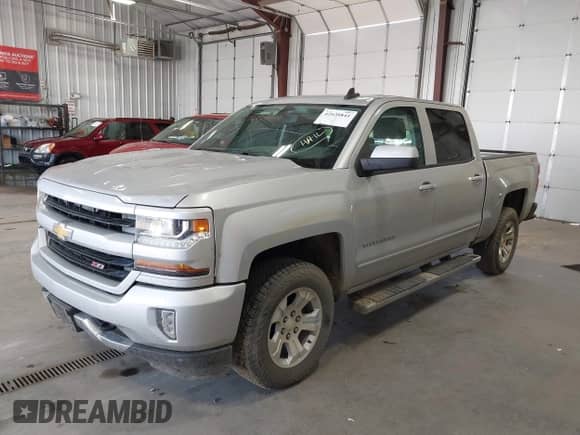 2016 Chevrolet Silverado 1500 LT with VIN 3GCUKREC0GG377694, listed as a IAAI auction lot 42638841 with 117,039 mi miles and . Bid and sale history available at DreamBid. Image 19.