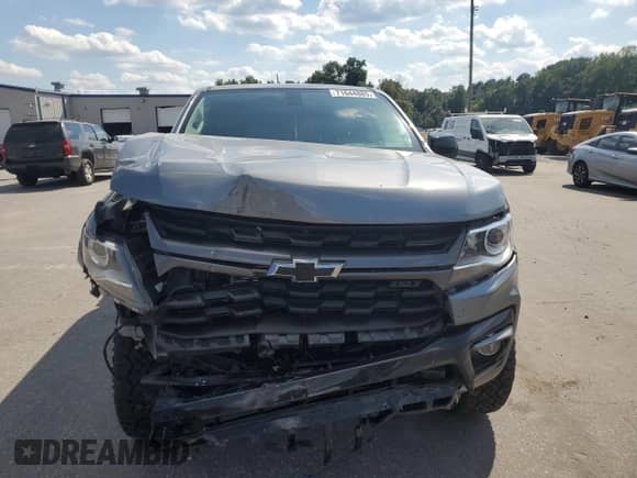 2022 Chevrolet Colorado 4WD Z71 with VIN 1GCGTDENXN1206820, listed as a Copart auction lot 71644885 with 48,237 mi miles and Salvage title. Bid and sale history available at DreamBid. Image 5.