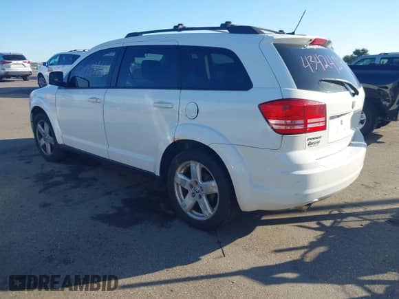 2009 Dodge Journey SXT with VIN 3D4GG57V59T591938, listed as a IAAI auction lot 43424114 with 189,515 mi miles and . Bid and sale history available at DreamBid. Image 3.