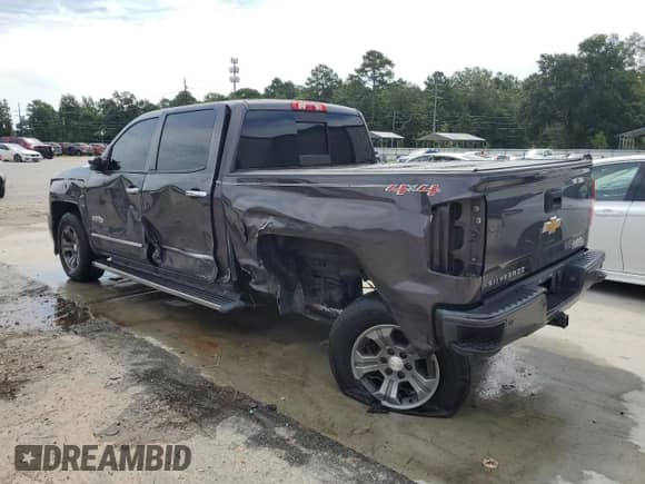 2014 Chevrolet Silverado 1500 High Country с VIN 3GCUKTEJ3EG543750, выставлен на аукционе Copart как лот 70409245 с пробегом Не указан миль и Списание • Salvage title. История ставок и продаж доступна на DreamBid. Изображение 2.