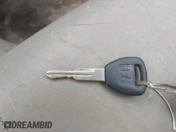 2000 Honda Accord EX z VIN 1HGCG1659YA095702, wystawiony jako IAAI lot #42989293 z przebiegiem 269 806 mil mil oraz . Historia ofert i sprzedaży dostępna na DreamBid. Obrazek 11.