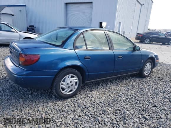 2002 Saturn SL с VIN 1G8ZF52812Z142498, выставлен на аукционе Copart как лот 48753605 с пробегом 113 493 миль миль и Списание • Salvage title. История ставок и продаж доступна на DreamBid. Изображение 3.