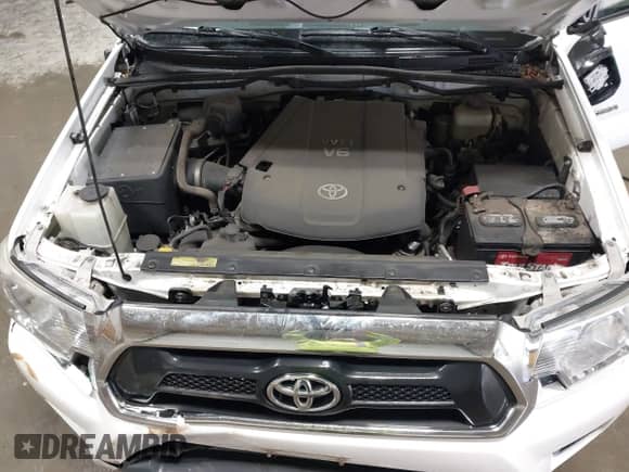2014 Toyota Tacoma with VIN 3TMLU4EN8EM148737, listed as a IAAI auction lot 43256920 with 106,235 mi miles and . Bid and sale history available at DreamBid. Image 10.
