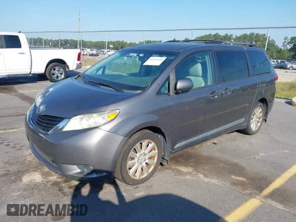 2011 Toyota Sienna LE with VIN 5TDJK3DC5BS019471, listed as a IAAI auction lot 43121145 with 214,140 mi miles and . Bid and sale history available at DreamBid. Image 17.