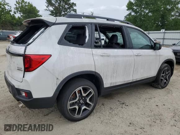 2023 Honda Passport Elite с VIN 5FNYF8H06PB022732, выставлен на аукционе Copart как лот 56893845 с пробегом 33 620 миль миль и Списание • Salvage title. История ставок и продаж доступна на DreamBid. Изображение 3.