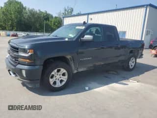 2019 Chevrolet Silverado 1500 LT with VIN 2GCVKPEC1K1182150, listed as a Copart auction lot 64535195 with 129,522 mi miles and Salvage title. Bid and sale history available at DreamBid. Image 1.