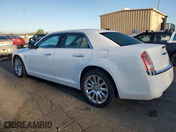2013 Chrysler 300 with VIN 2C3CCAAG2DH697523, listed as a Copart auction lot 85885345 with 103,712 mi miles and Salvage title. Bid and sale history available at DreamBid. Image 2.