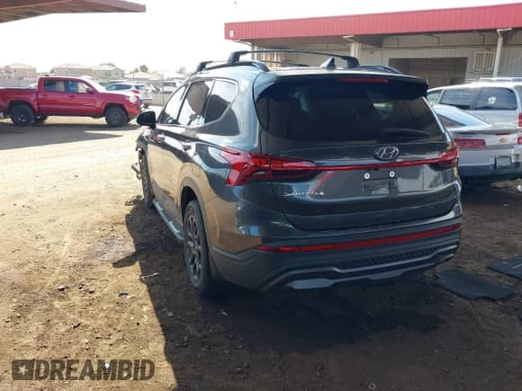 2022 Hyundai Santa Fe XRT z VIN 5NMS64AJ4NH383194, wystawiony jako IAAI lot #43270179 z przebiegiem 28 393 mil mil oraz . Historia ofert i sprzedaży dostępna na DreamBid. Obrazek 3.