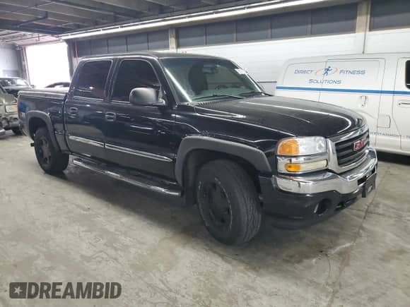 2006 GMC Sierra 1500 SLT with VIN 2GTEK13Z061354212, listed as a Copart auction lot 86314035 with 228,654 mi miles and Clean title. Bid and sale history available at DreamBid. Image 4.