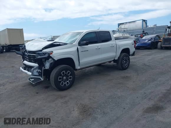 2023 Chevrolet Colorado 4WD Z71 with VIN 1GCPTDEK9P1219177, listed as a IAAI auction lot 42226373 with 26,238 mi miles and . Bid and sale history available at DreamBid. Image 2.