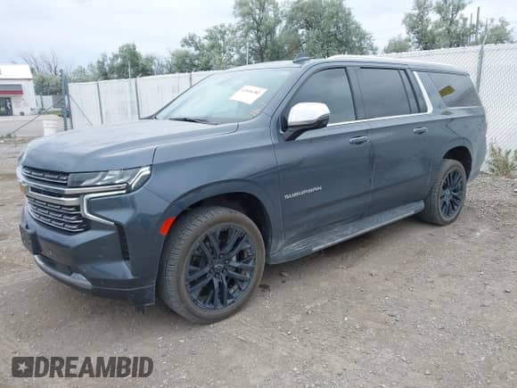 2021 Chevrolet Suburban Premier z VIN 1GNSKFKD5MR245553, wystawiony jako IAAI lot #42646382 z przebiegiem 91 092 mil mil oraz . Historia ofert i sprzedaży dostępna na DreamBid. Obrazek 2.