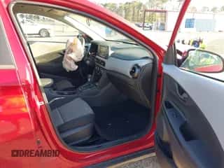 2020 Hyundai Kona SE with VIN KM8K12AA2LU430887, listed as a IAAI auction lot 43338432 with 76,957 mi miles and . Bid and sale history available at DreamBid. Image 5.