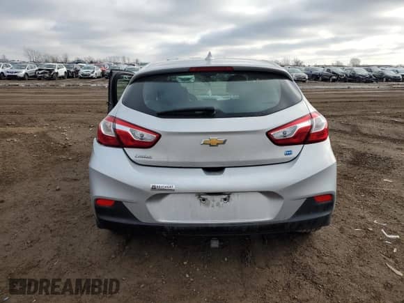 2018 Chevrolet Cruze LT с VIN 3G1BH6SE8JS650680, выставлен на аукционе Copart как лот 85450164 с пробегом 82 765 миль миль и Списание • Salvage title. История ставок и продаж доступна на DreamBid. Изображение 6.