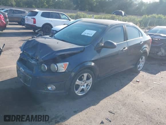 2016 Chevrolet Sonic LTZ with VIN 1G1JE5SB6G4137621, listed as a IAAI auction lot 42908761 with 180,882 mi miles and . Bid and sale history available at DreamBid. Image 2.