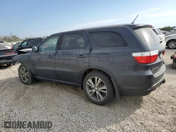 2013 Dodge Durango R/T z VIN 1C4SDJCT1DC602452, wystawiony jako Copart lot #84448755 z przebiegiem 229 781 mil mil oraz Szkoda całkowita • Salvage title. Historia ofert i sprzedaży dostępna na DreamBid. Obrazek 2.