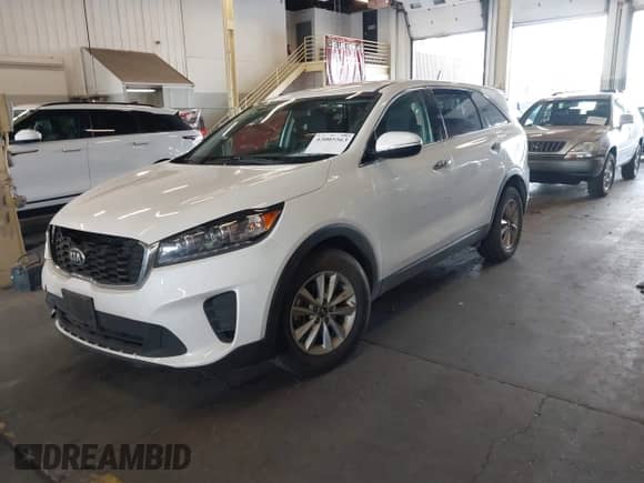 2020 Kia Sorento LX z VIN 5XYPG4A32LG638954, wystawiony jako IAAI lot #43005563 z przebiegiem 101 052 mil mil oraz . Historia ofert i sprzedaży dostępna na DreamBid. Obrazek 17.