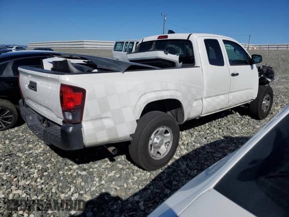 2022 Toyota Tacoma SR with VIN 3TYRX5GN1NT039500, listed as a Copart auction lot 82454915 with 114,480 mi miles and Salvage title. Bid and sale history available at DreamBid. Image 3.