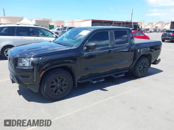 2022 Nissan Frontier S with VIN 1N6ED1EJ2NN611219, listed as a IAAI auction lot 42853516 with 51,423 mi miles and . Bid and sale history available at DreamBid. Image 2.