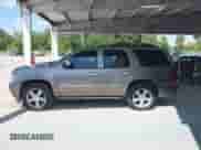 2011 Chevrolet Tahoe LTZ with VIN 1GNSCCE09BR333023, listed as a IAAI auction lot 43085215 with 165,616 mi miles and . Bid and sale history available at DreamBid. Image 14.