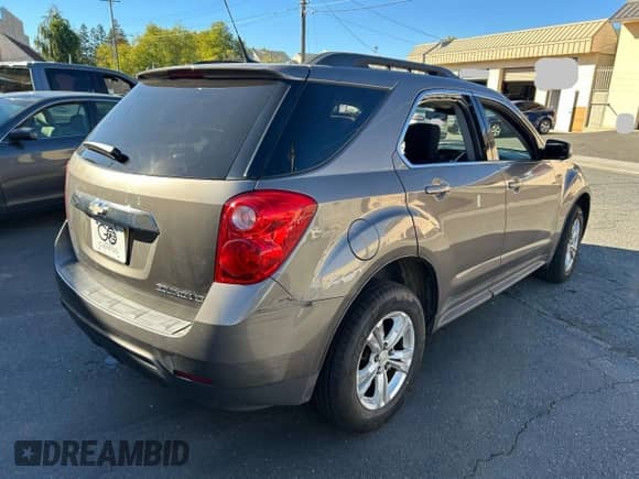 2012 Chevrolet Equinox 1LT with VIN 2GNALDEK5C6174839, listed as a Copart auction lot 85415105 with 153,052 mi miles and Clean title. Bid and sale history available at DreamBid. Image 4.