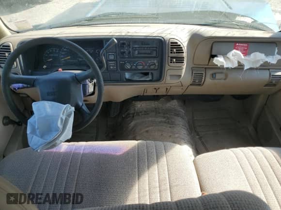 1998 GMC Sierra 1500 z VIN 1GTEC19W4WE521888, wystawiony jako Copart lot #53161505 z przebiegiem 985 004 mil mil oraz Szkoda całkowita • Salvage title. Historia ofert i sprzedaży dostępna na DreamBid. Obrazek 8.