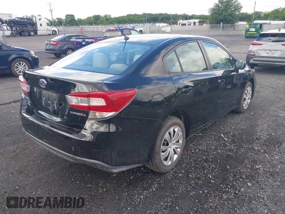 2019 Subaru Impreza with VIN 4S3GKAB67K3620703, listed as a IAAI auction lot 42284703 with 79,474 mi miles and . Bid and sale history available at DreamBid. Image 4.