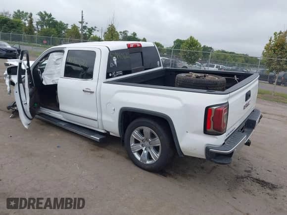 2017 GMC Sierra 1500 SLT with VIN 3GTU2NEC6HG345813, listed as a IAAI auction lot 42940622 with 174,127 mi miles and . Bid and sale history available at DreamBid. Image 3.