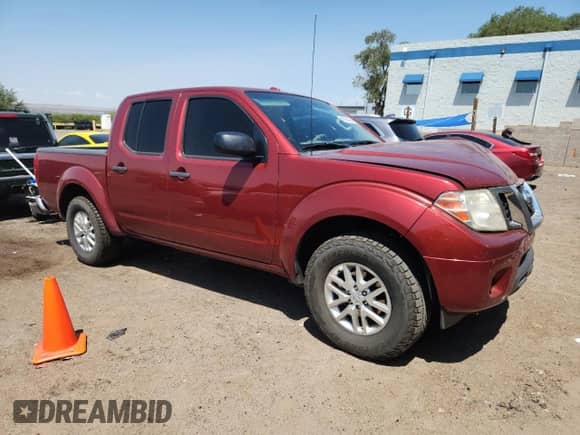 2016 Nissan Frontier S with VIN 1N6AD0ERXGN796847, listed as a Copart auction lot 68969855 with 200,318 mi miles and Salvage title. Bid and sale history available at DreamBid. Image 4.