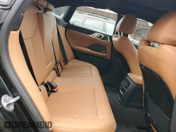 2024 BMW i4 xDrive40 with VIN WBY83FB09RFS54860, listed as a Copart auction lot 59111825 with 12,006 mi miles and Salvage title. Bid and sale history available at DreamBid. Image 10.