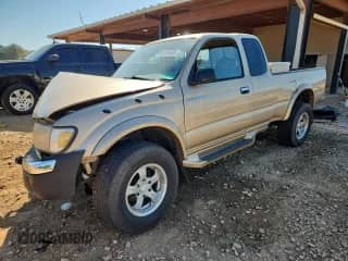 1999 Toyota Tacoma PreRunner z VIN 4TASN92N5XZ570021, wystawiony jako Copart lot #85151085 z przebiegiem 212 706 mil mil oraz Szkoda całkowita • Salvage title. Historia ofert i sprzedaży dostępna na DreamBid. Obrazek 1.