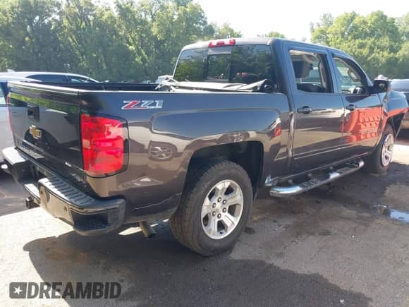 2016 Chevrolet Silverado 1500 LT with VIN 3GCUKRECXGG137939, listed as a IAAI auction lot 42653649 with 122,925 mi miles and . Bid and sale history available at DreamBid. Image 4.